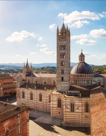 woman-in-front-of-siena-cathedral-in-tuscany-ital-2022-02-16-01-27-36-utc (1) (1).jpg